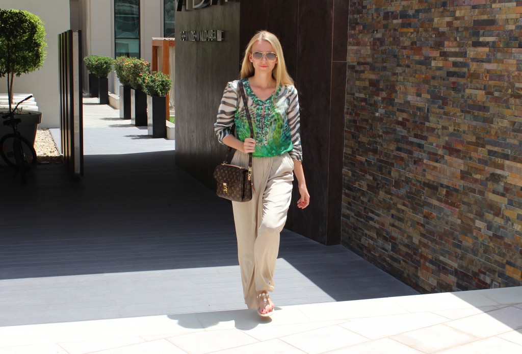 Outfit VIDA Hotel Downtown Dubai Green silk and the city