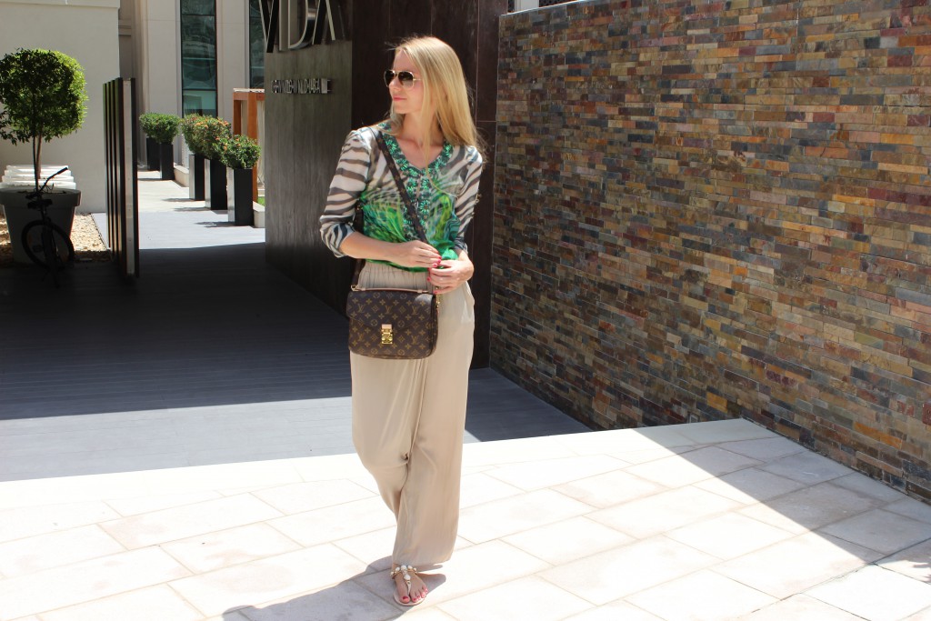 Outfit VIDA Hotel Downtown Dubai Green silk and the city